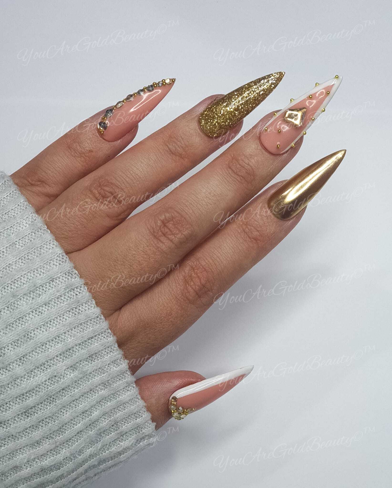 Stiletto Shaped nails Gold nail designs Gold glitter nails Gold Rhinestone nails Stiletto French tip designs 
