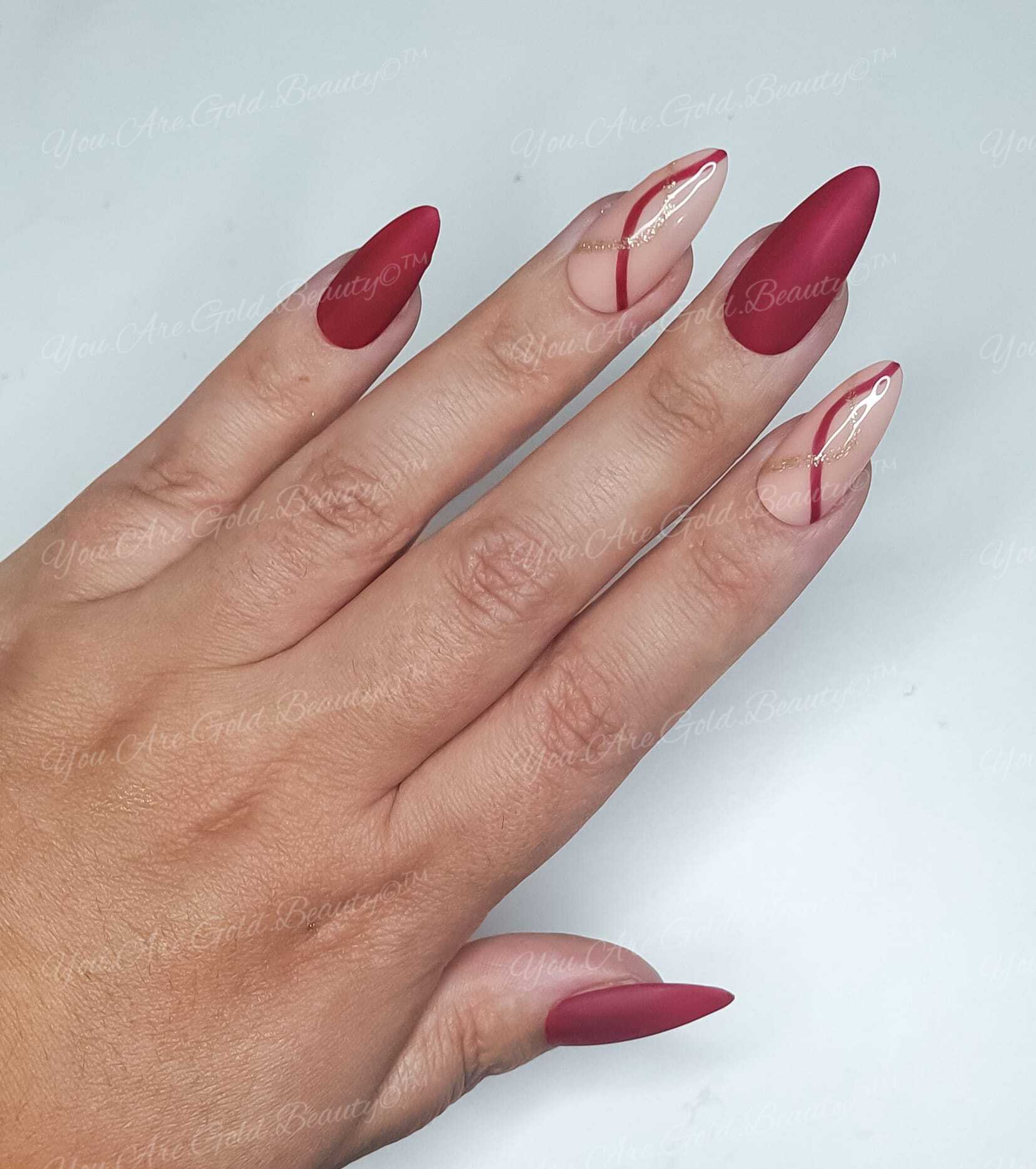 Red and gold press on nails uk with gold glitter almond shaped nails 